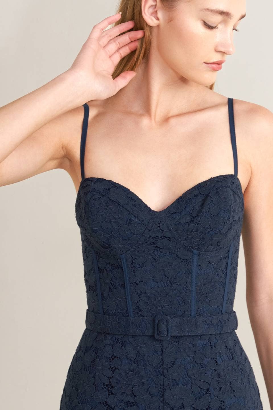 A solid woven lace jumpsuit