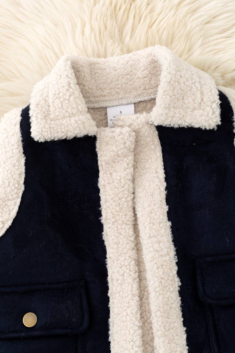 Black faux suede and sherpa vest.