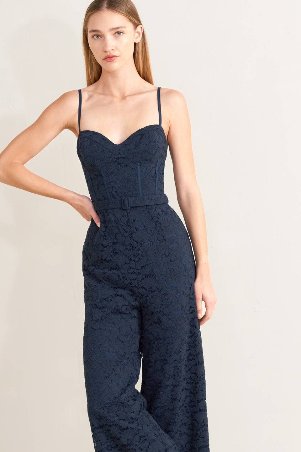 A solid woven lace jumpsuit