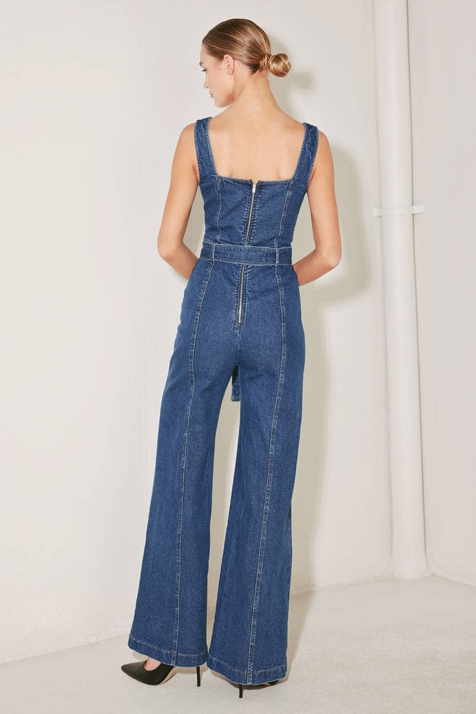 A washed denim jumpsuit