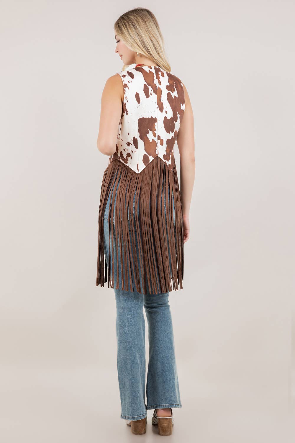 BROWN COW PRINT LONG FRINGE FAUX SUDE VEST