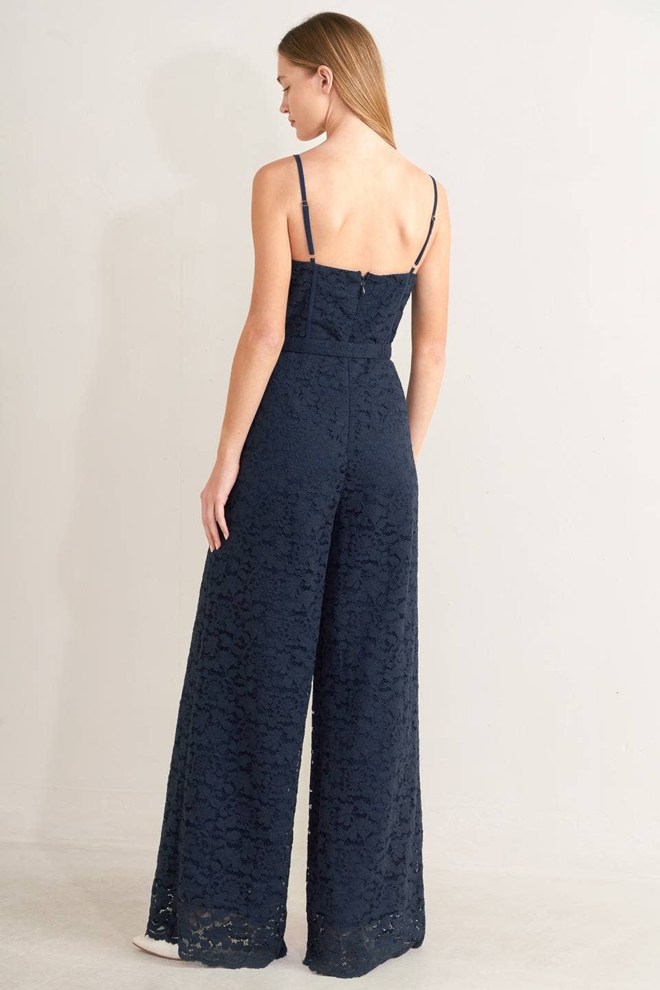 A solid woven lace jumpsuit