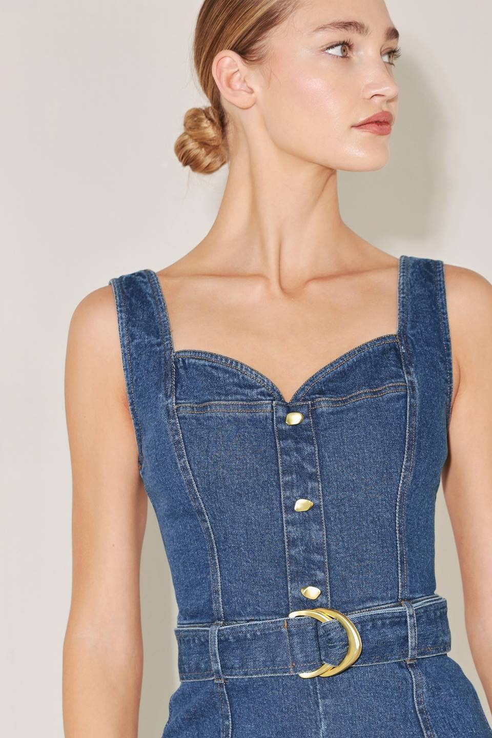 A washed denim jumpsuit