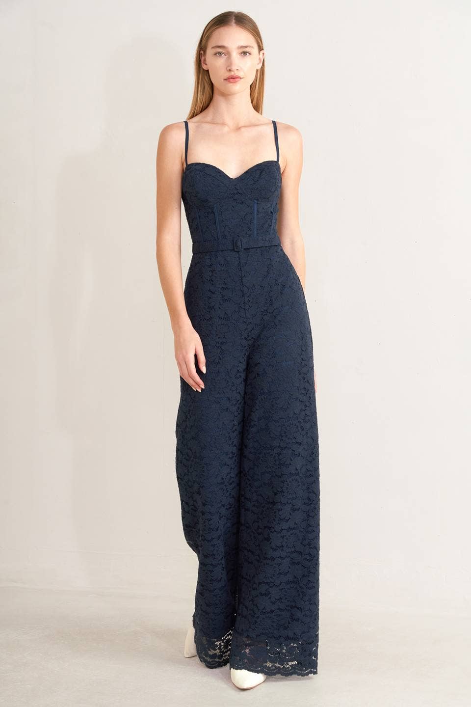 A solid woven lace jumpsuit